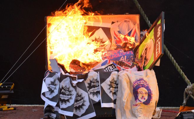 Joe Corre, the son of Vivienne Westwood and Sex Pistols creator Malcolm McLaren, burns his £5 million punk collection on a boat on the River Thames in London.